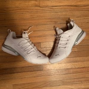 Puma white athletic shoes